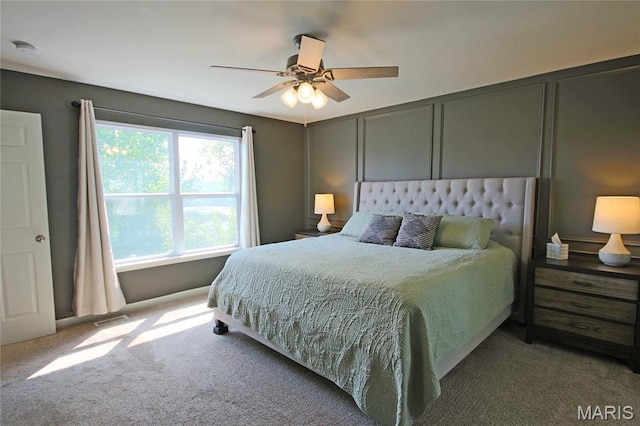 1030 Remington Dr, Imperial, MO 63052 - carpeted bedroom featuring a decorative wall and a ceiling fan