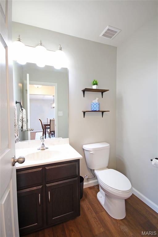 1030 Remington Dr, Imperial, MO 63052 - bathroom with vanity and wood finished floors