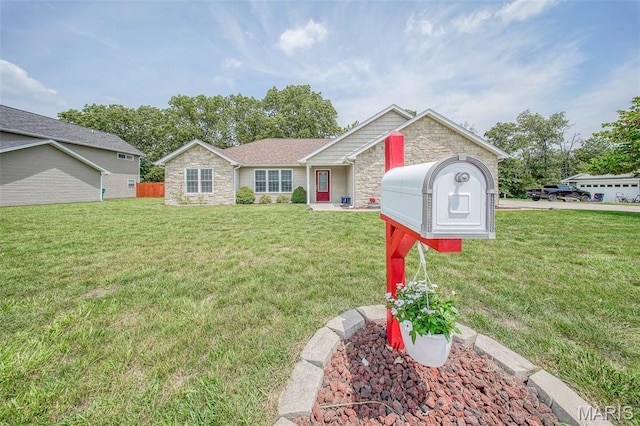 11195 Lexington Ln, Rolla, MO 65401 - view of front facade with stone siding and a front lawn