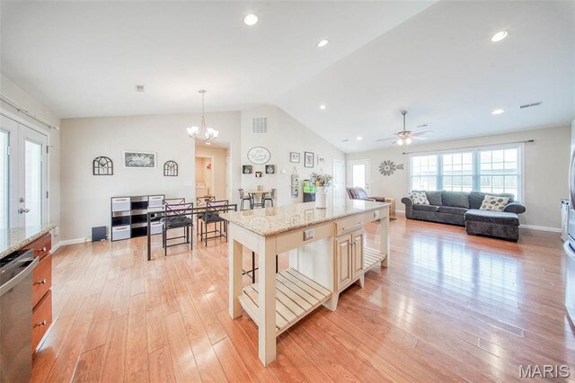 11195 Lexington Ln, Rolla, MO 65401 - kitchen with dishwasher, light wood finished floors, vaulted ceiling, a chandelier, and a ceiling fan