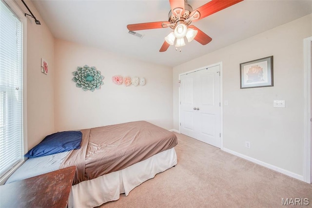 11195 Lexington Ln, Rolla, MO 65401 - carpeted bedroom featuring baseboards and a ceiling fan