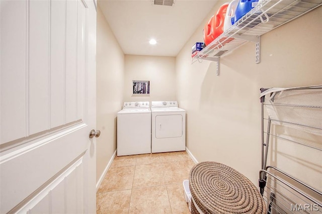 11195 Lexington Ln, Rolla, MO 65401 - laundry room featuring baseboards, light tile patterned flooring, and washing machine and dryer