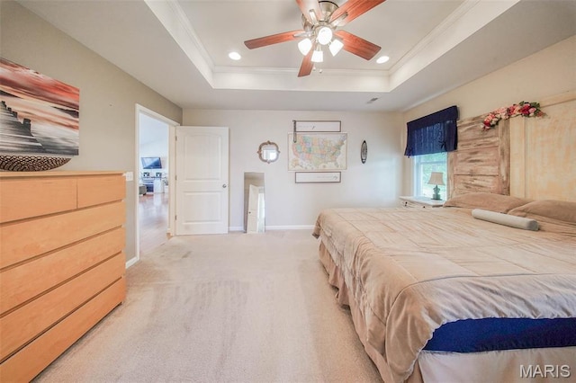 11195 Lexington Ln, Rolla, MO 65401 - bedroom with light colored carpet, baseboards, crown molding, a tray ceiling, and recessed lighting