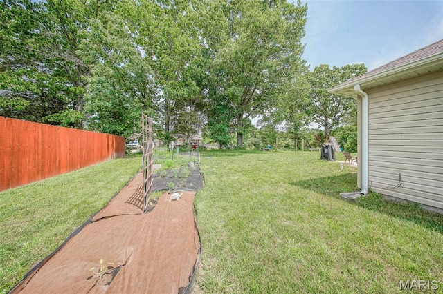 11195 Lexington Ln, Rolla, MO 65401 - view of yard with view of wooded area