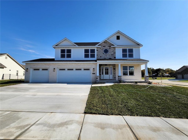 3710 Thicket Dr, Shiloh, IL 62221 - view of front of property with concrete driveway, covered porch, brick siding, and an attached garage
