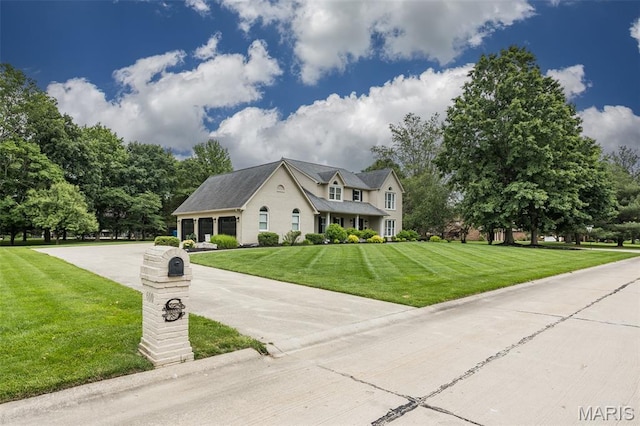600 E Waters Edge Dr, Shiloh, IL 62221 - view of front of house featuring a front yard and driveway