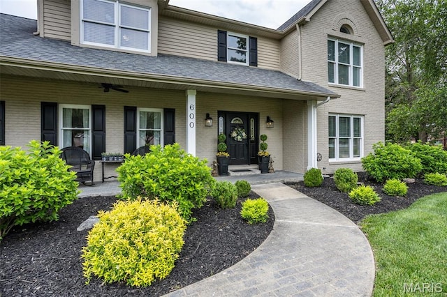 600 E Waters Edge Dr, Shiloh, IL 62221 - view of front of property with a porch, brick siding, and roof with shingles