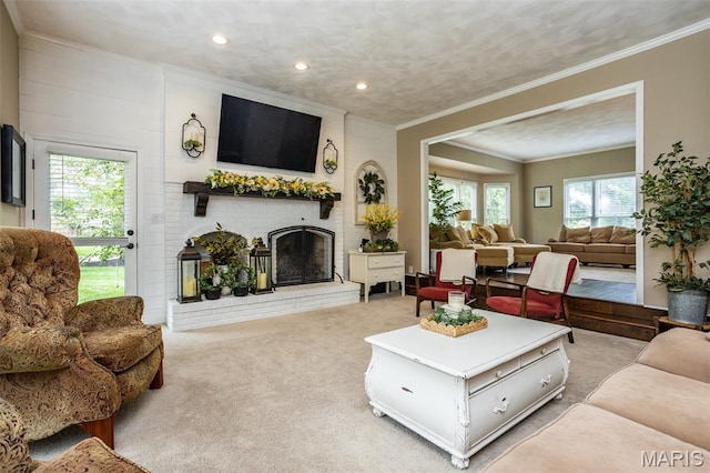 600 E Waters Edge Dr, Shiloh, IL 62221 - living area featuring crown molding, light colored carpet, recessed lighting, and a brick fireplace