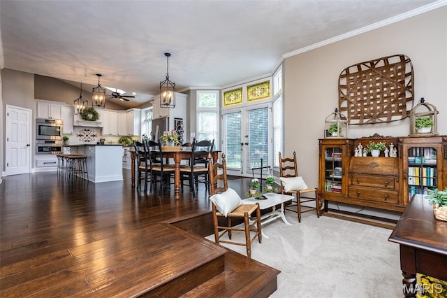 600 E Waters Edge Dr, Shiloh, IL 62221 - dining area featuring wood finished floors, a chandelier, and ornamental molding