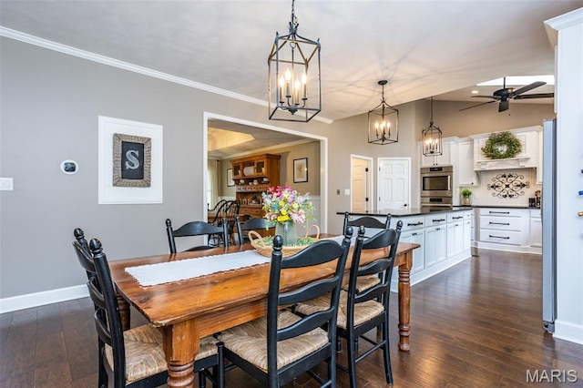 600 E Waters Edge Dr, Shiloh, IL 62221 - dining space featuring a ceiling fan, dark wood-type flooring, baseboards, ornamental molding, and a chandelier