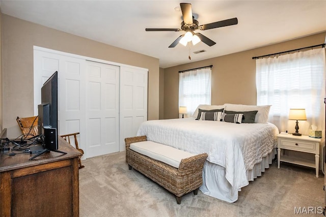 600 E Waters Edge Dr, Shiloh, IL 62221 - bedroom with light carpet, a closet, and ceiling fan