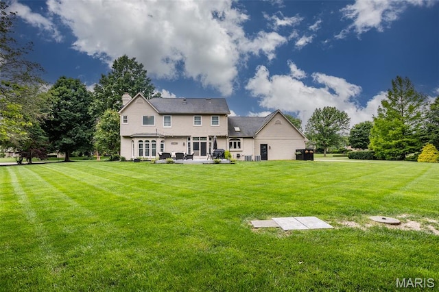 600 E Waters Edge Dr, Shiloh, IL 62221 - rear view of property with a lawn, a chimney, and a patio area