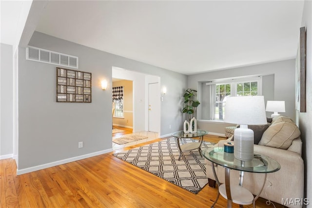 894 Napoli Dr, Ballwin, MO 63021 - living area with light wood finished floors and baseboards