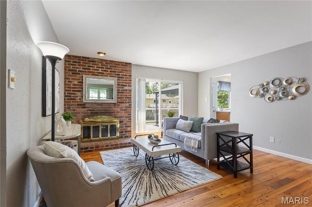 894 Napoli Dr, Ballwin, MO 63021 - living area with hardwood / wood-style floors and baseboards