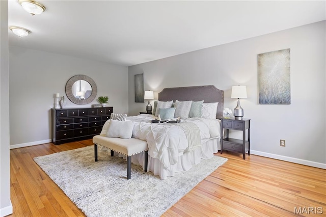 894 Napoli Dr, Ballwin, MO 63021 - bedroom with wood finished floors and baseboards