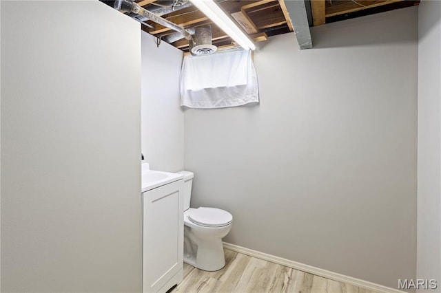 894 Napoli Dr, Ballwin, MO 63021 - bathroom featuring vanity and wood finished floors