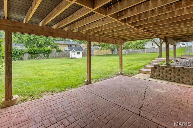 894 Napoli Dr, Ballwin, MO 63021 - fenced backyard with a patio and a shed