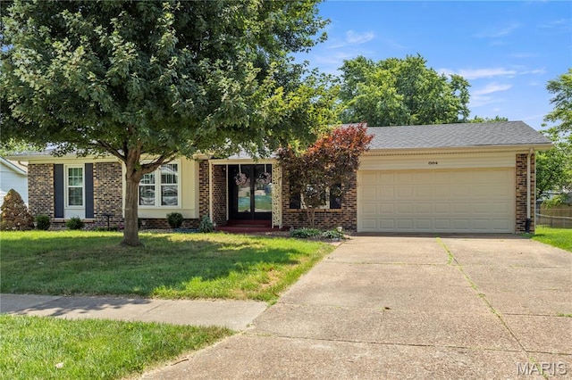 894 Napoli Dr, Ballwin, MO 63021 - view of property hidden behind natural elements with brick siding, driveway, an attached garage, and a front lawn