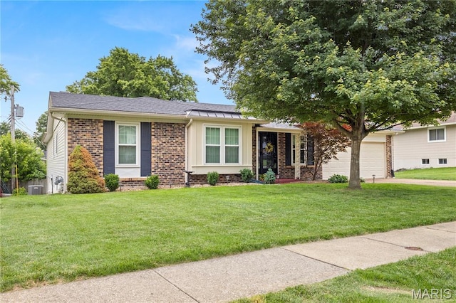 894 Napoli Dr, Ballwin, MO 63021 - ranch-style house featuring an attached garage, a front lawn, and brick siding