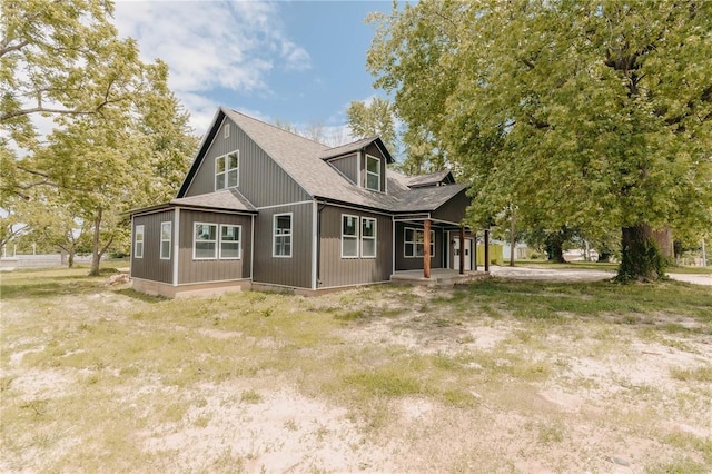 506 W 4th St, Dixon, MO 65459 - rear view of property with a shingled roof