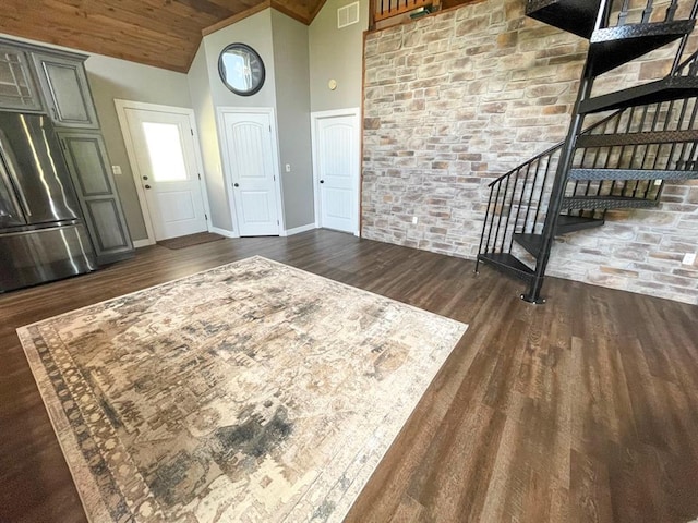 18428 Lake Circle Dr, Dexter, MO 63841 - foyer with high vaulted ceiling, dark wood-style flooring, stairway, baseboards, and wood ceiling