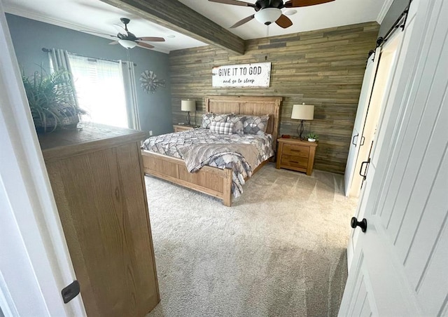 18428 Lake Circle Dr, Dexter, MO 63841 - carpeted bedroom with wooden walls, beamed ceiling, a ceiling fan, and a barn door