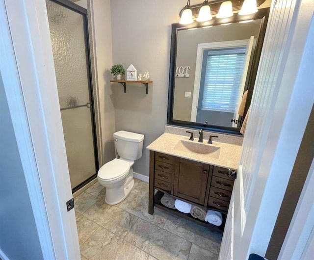 18428 Lake Circle Dr, Dexter, MO 63841 - bathroom featuring toilet, vanity, and a shower stall