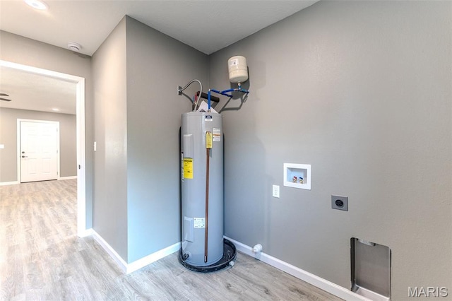 1223 Utah St, Lebanon, MO 65536 - utility room featuring water heater