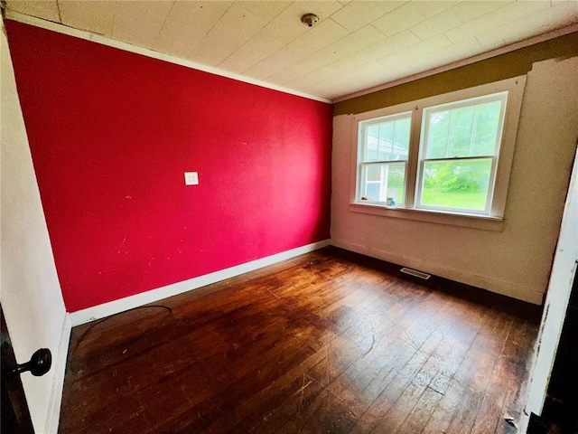 533 W Hawthorne St, Houston, MO 65483 - unfurnished room featuring wood-type flooring, baseboards, and crown molding