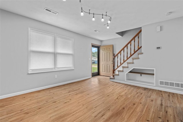 518 Bargraves Blvd Unit B, Troy, IL 62294 - entrance foyer featuring wood finished floors, stairs, and baseboards