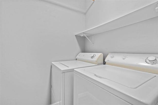 518 Bargraves Blvd Unit B, Troy, IL 62294 - laundry area with washing machine and clothes dryer and attic access