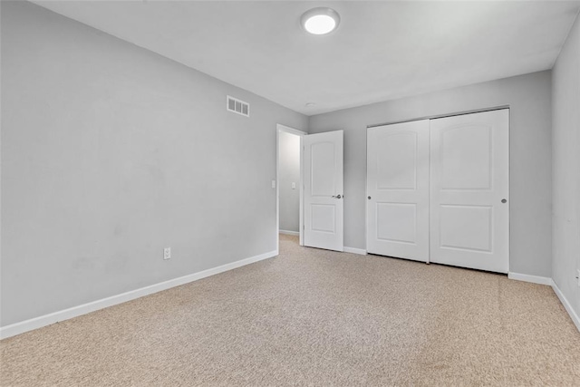 518 Bargraves Blvd Unit B, Troy, IL 62294 - unfurnished bedroom with baseboards, carpet floors, and a closet