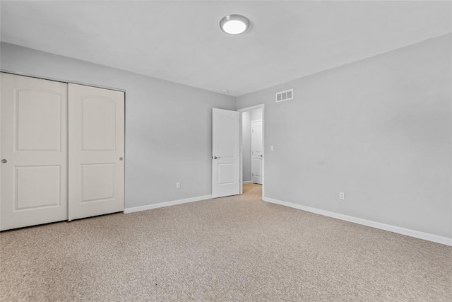 518 Bargraves Blvd Unit B, Troy, IL 62294 - unfurnished bedroom with baseboards, light colored carpet, and a closet