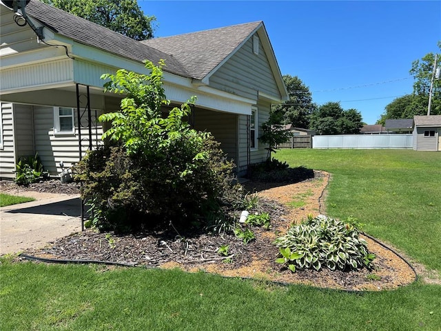 1904 E Parkview, Caruthersville, MO 63830 - view of side of home with roof with shingles