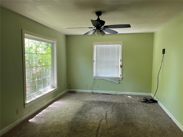 1904 E Parkview, Caruthersville, MO 63830 - spare room featuring carpet floors, baseboards, and ceiling fan