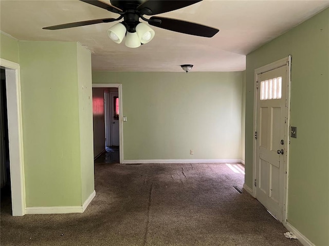 1904 E Parkview, Caruthersville, MO 63830 - unfurnished room with carpet floors, baseboards, and ceiling fan