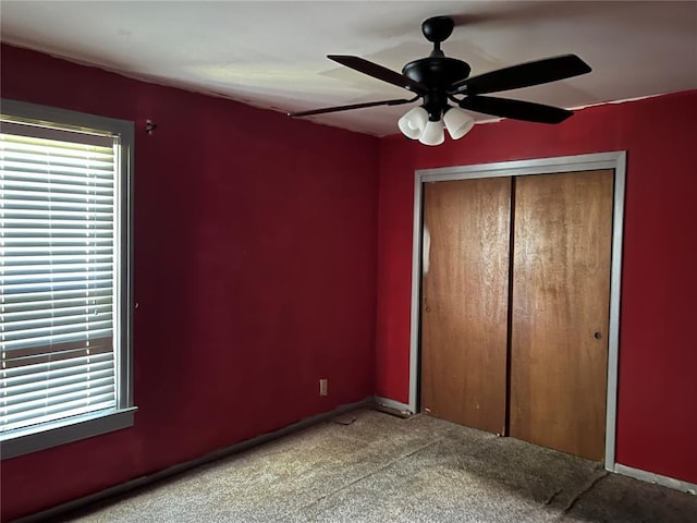 1904 E Parkview, Caruthersville, MO 63830 - unfurnished bedroom featuring carpet, a closet, baseboards, and a ceiling fan