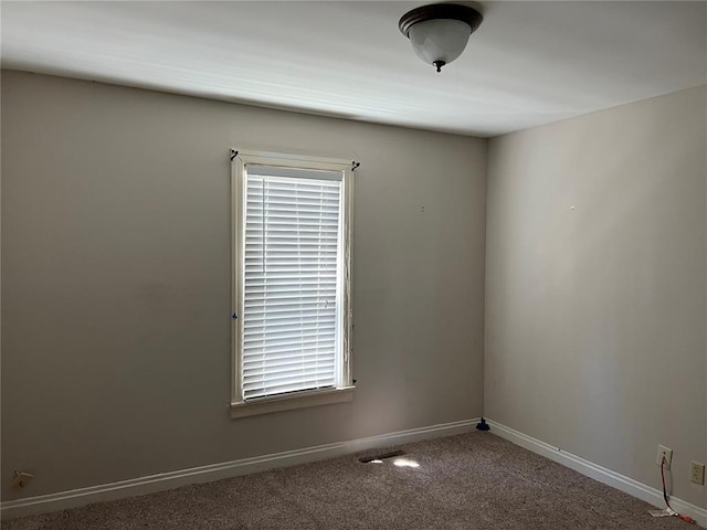 1904 E Parkview, Caruthersville, MO 63830 - empty room with baseboards and carpet