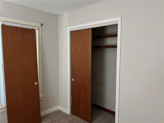 1904 E Parkview, Caruthersville, MO 63830 - unfurnished bedroom featuring carpet floors, a closet, and baseboards