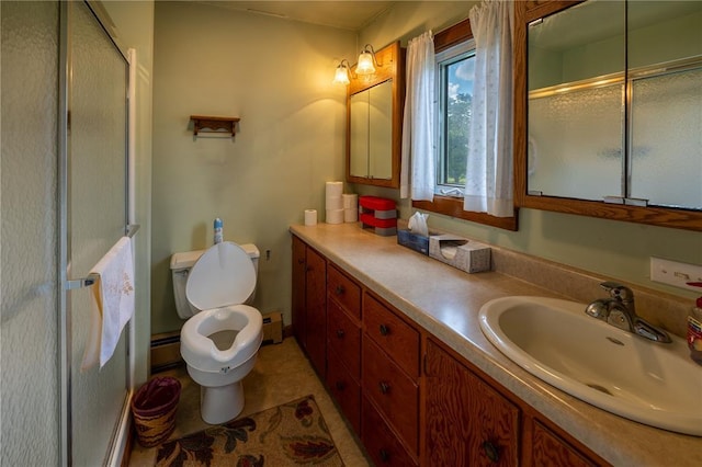 216 County Road 512, Shawneetown, MO 63732 - bathroom featuring toilet, baseboard heating, and an enclosed shower