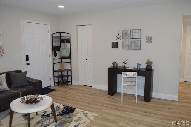 115 Lemans Ct Unit 115, Lake St Louis, MO 63367 - living room featuring light wood-style flooring, baseboards, and recessed lighting