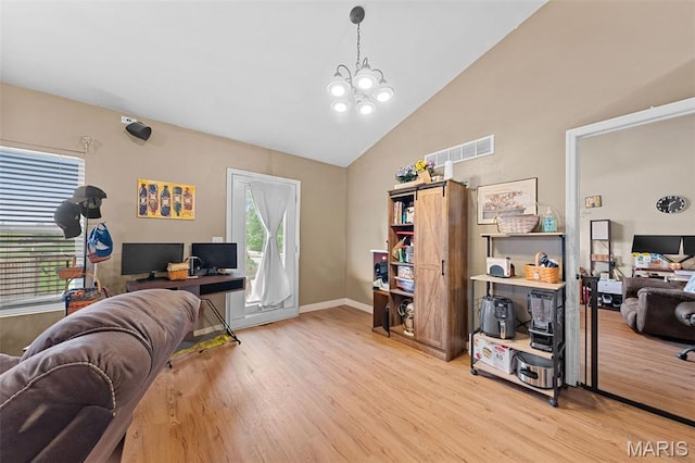 81 Berretta Ct, Wright City, MO 63390 - office space with light wood finished floors, high vaulted ceiling, a chandelier, and baseboards
