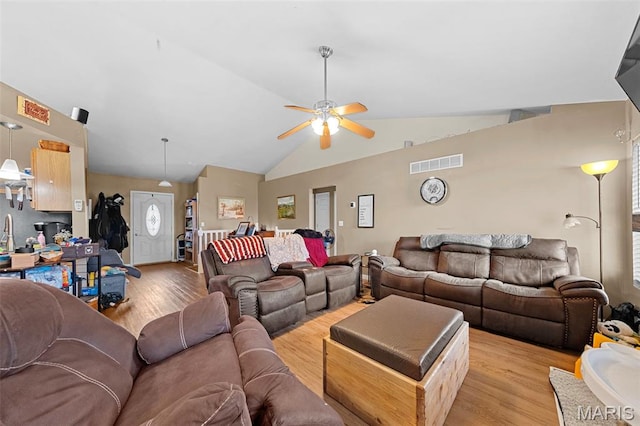 81 Berretta Ct, Wright City, MO 63390 - living room with plenty of natural light, light wood-style floors, ceiling fan, and vaulted ceiling