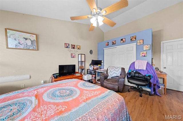 81 Berretta Ct, Wright City, MO 63390 - bedroom featuring wood finished floors, a closet, high vaulted ceiling, and ceiling fan