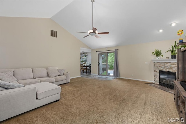 248 Prairie Grass Rd, Chatham, IL 62629 - carpeted living area featuring a ceiling fan, baseboards, a fireplace, and high vaulted ceiling