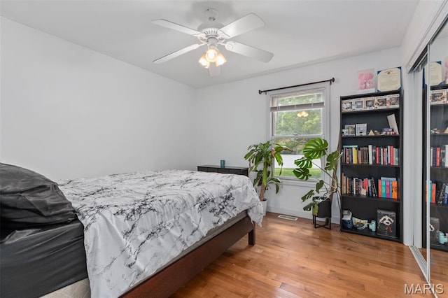 248 Prairie Grass Rd, Chatham, IL 62629 - bedroom featuring wood finished floors and a ceiling fan