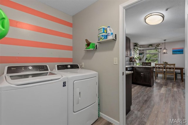 248 Prairie Grass Rd, Chatham, IL 62629 - laundry area featuring separate washer and dryer and wood finished floors