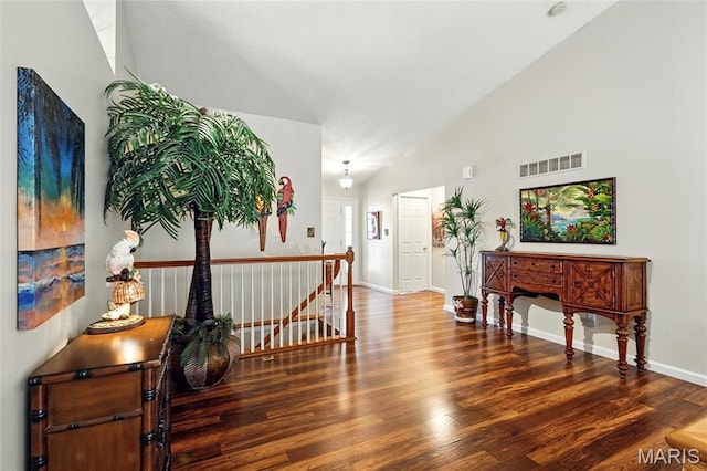 105 Silo Valley Dr, Wentzville, MO 63385 - hallway with wood finished floors, an upstairs landing, and vaulted ceiling