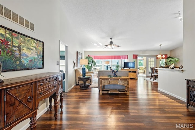 105 Silo Valley Dr, Wentzville, MO 63385 - living area featuring wood finished floors, a textured ceiling, and ceiling fan