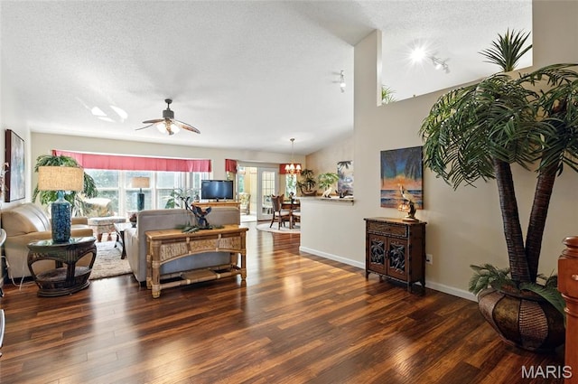 105 Silo Valley Dr, Wentzville, MO 63385 - living room featuring a textured ceiling, wood finished floors, a ceiling fan, lofted ceiling, and rail lighting
